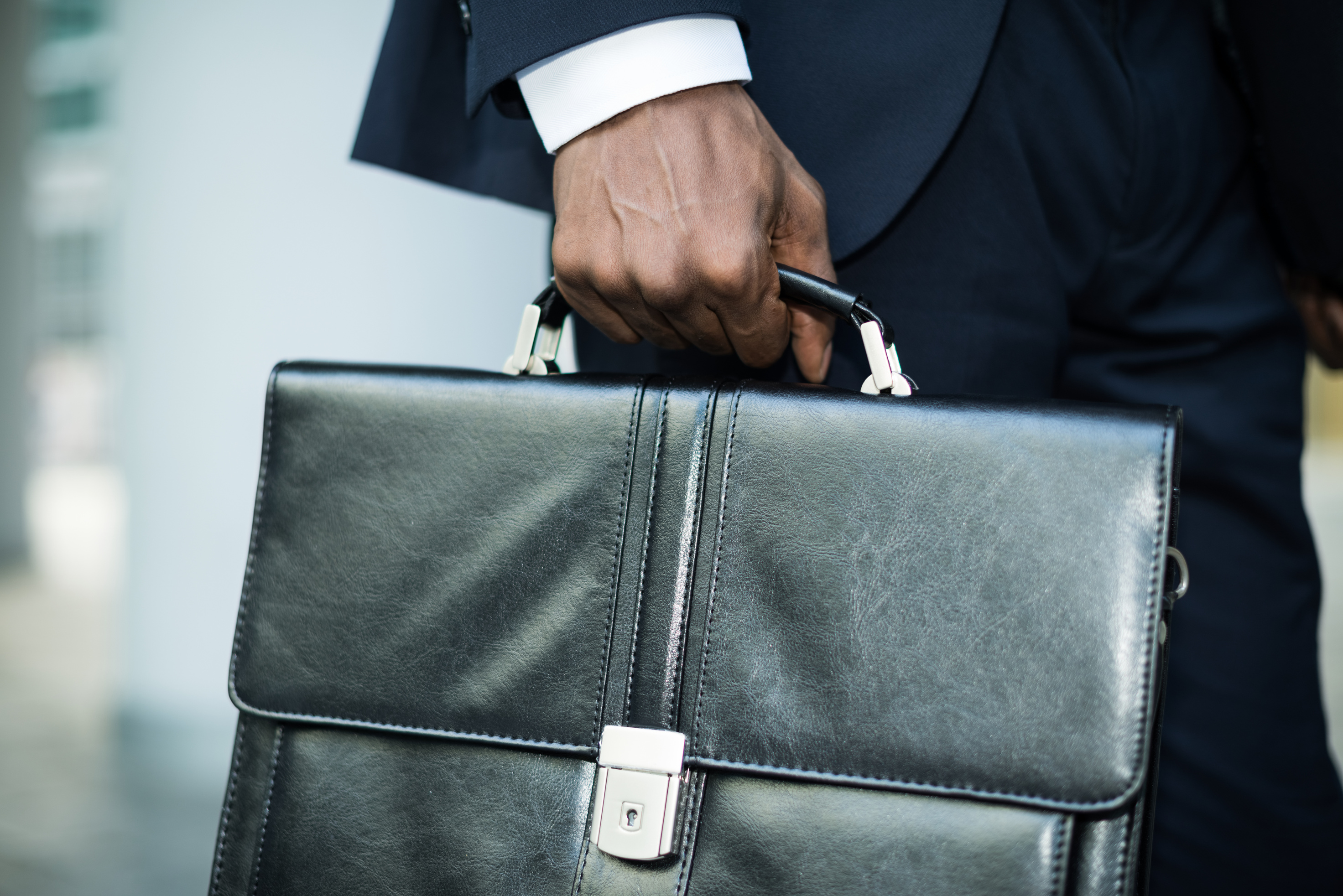 Businessperson Holding a Briefcase